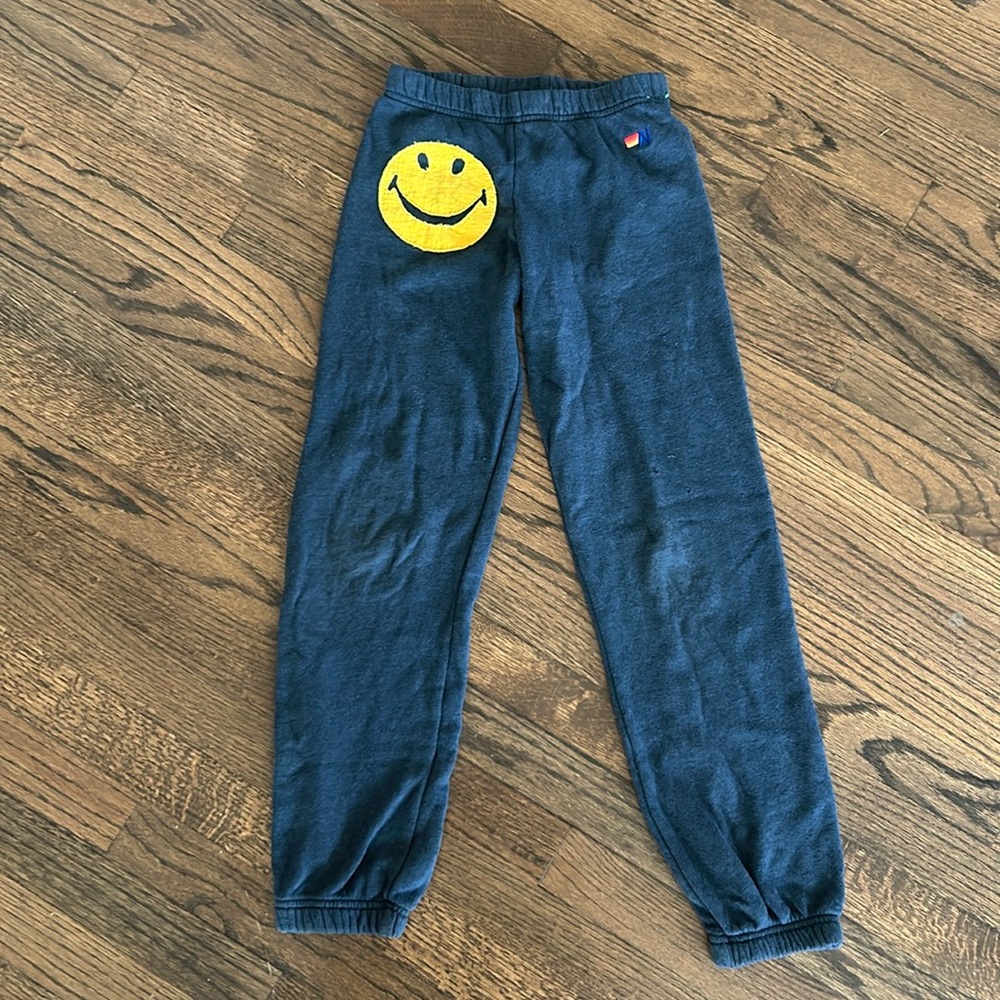 Aviator Nation sweatpants smiley face
